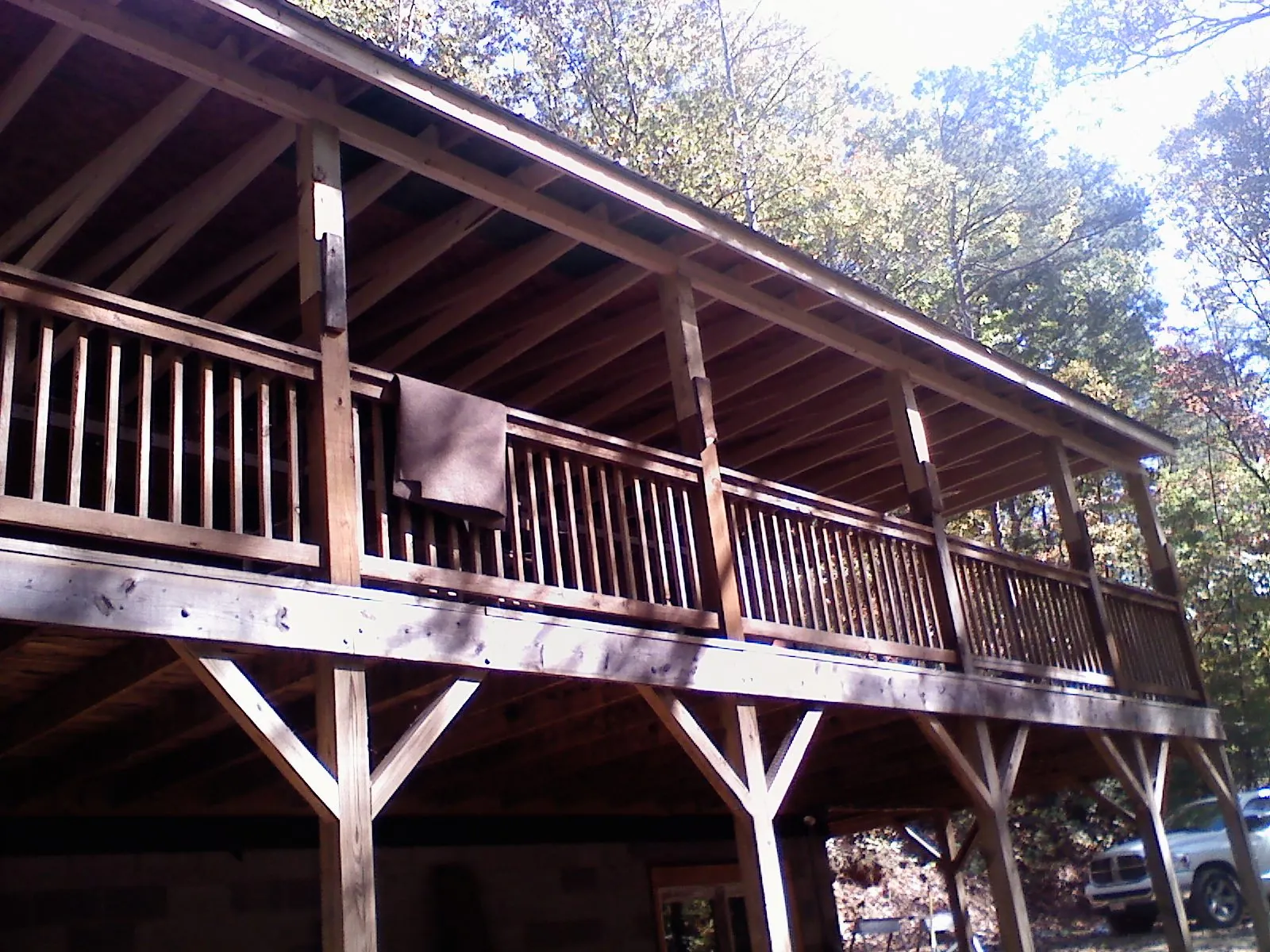 Timber framing under a new elevated porch and deck — Roof Leak Repair in Piqua by Roofing Brothers